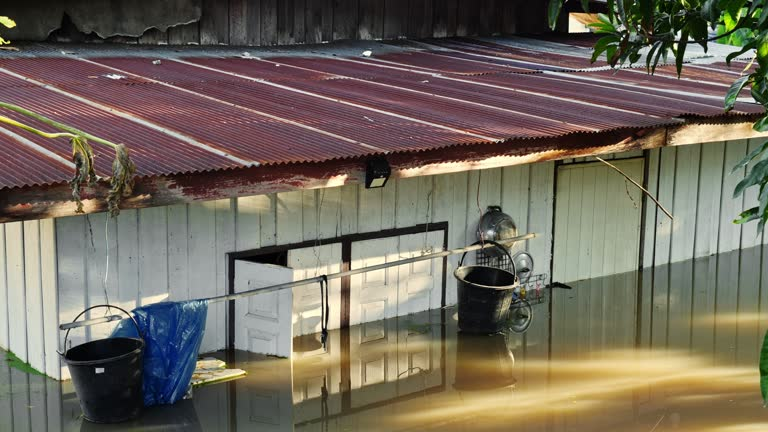  Flood water encircles a house, emphasizing the importance of professional clean-up companies.House Flooding Clean-Up Companies in Marana, AZ