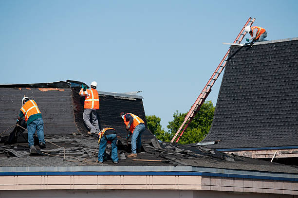 Two photos depict men working on a roof with a blue air conditioner, emphasizing the theme of Restoration Services Protect.