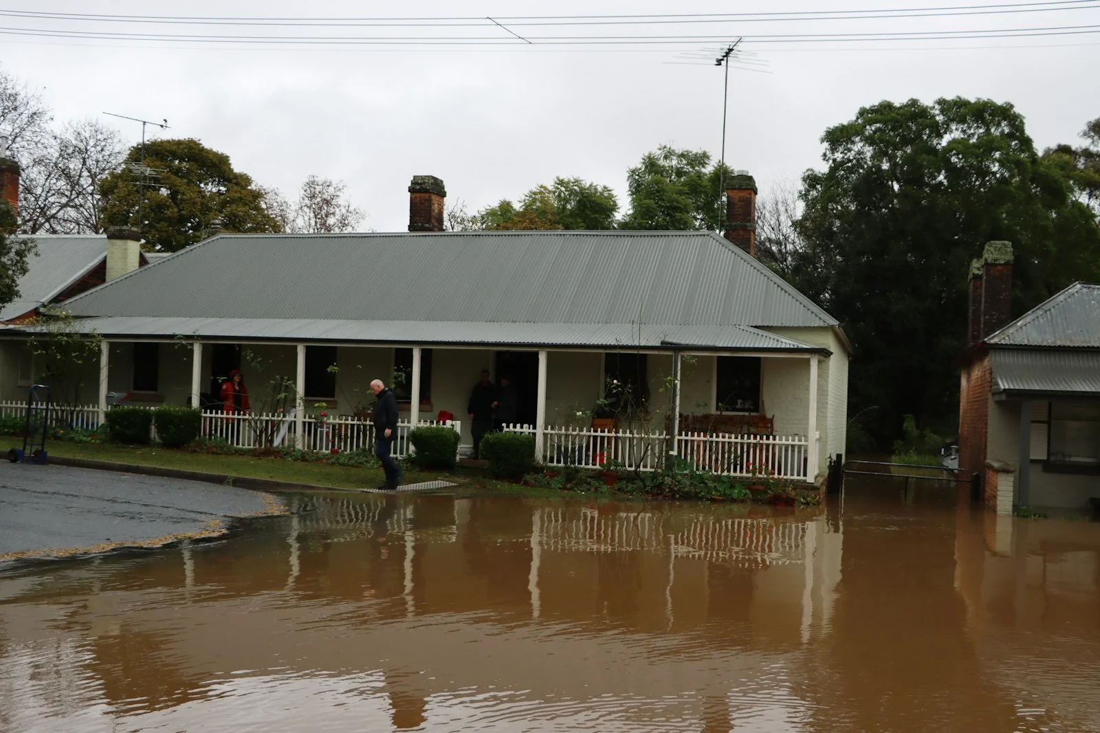 House surrounded by flood water after a storm