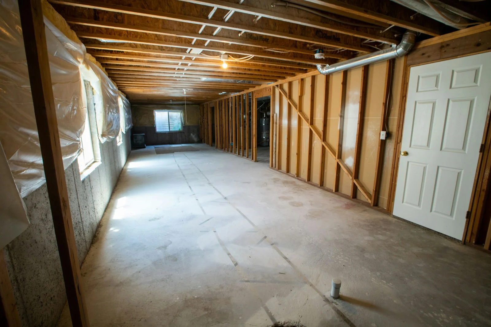 Exposed wall framing during structural drying