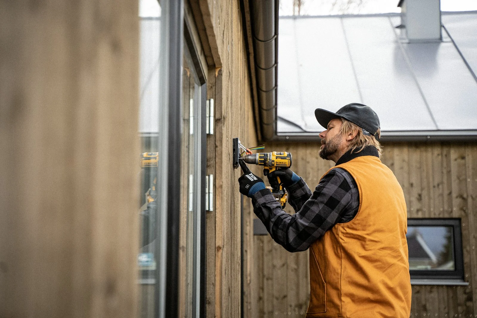 Contractor drilling during a home repair